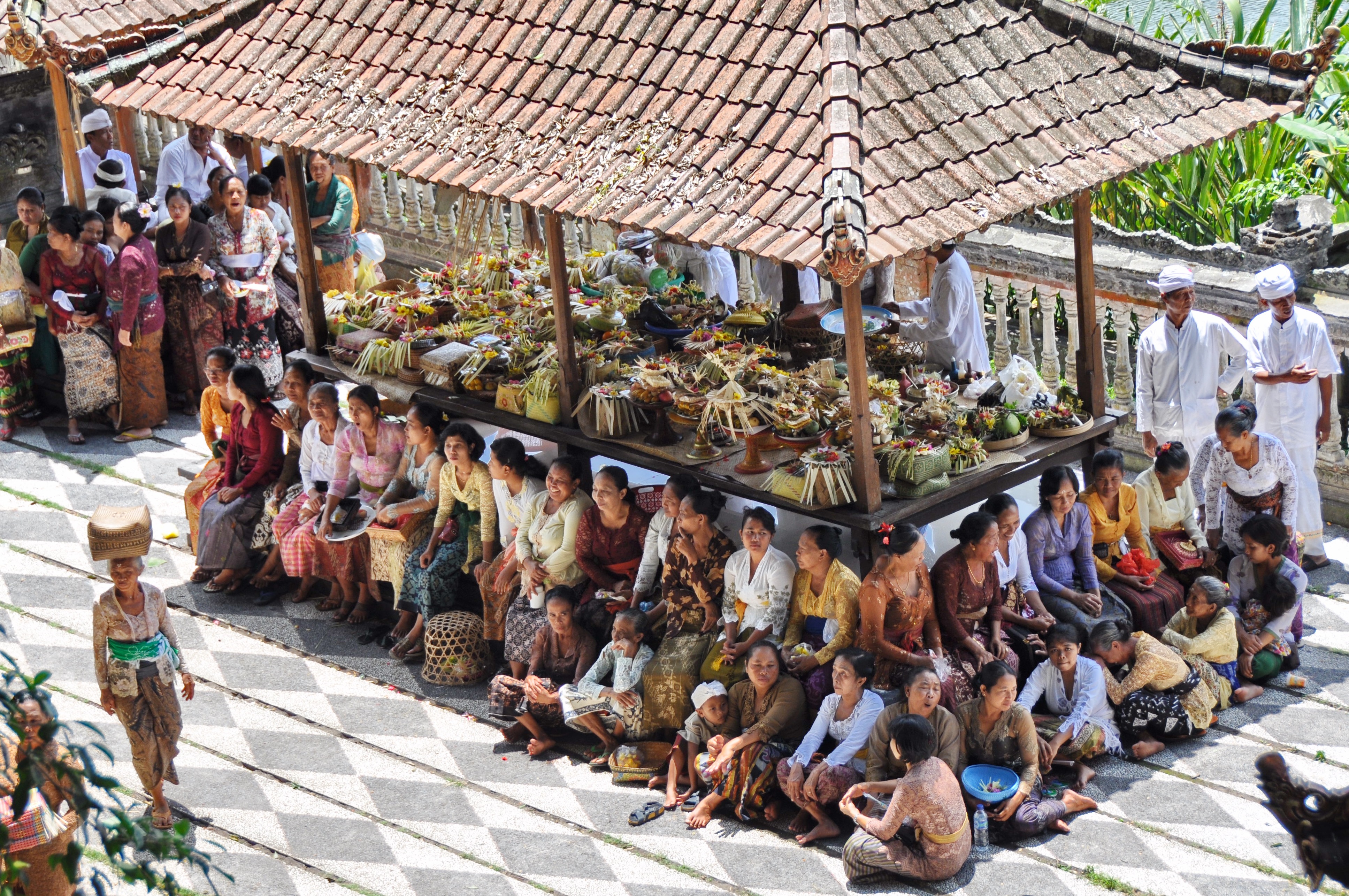 Worshippers congregate in Tirta Gangga Palace in Amlapura